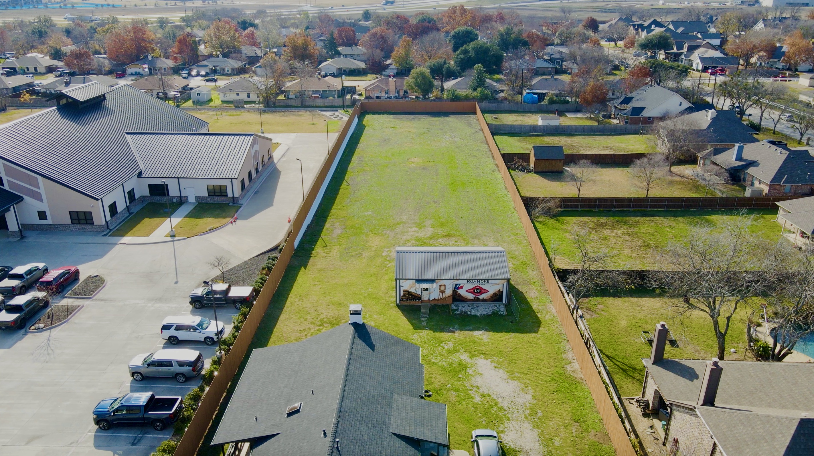Overhead view showing the long open yard behind the Roanoke property