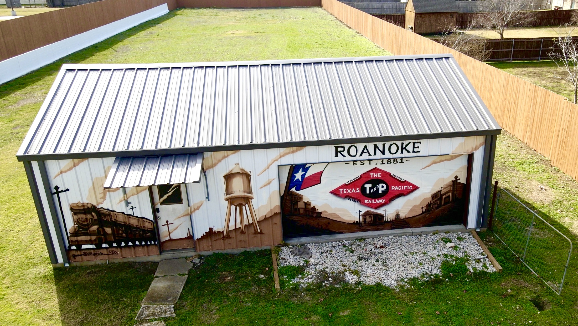 Small Roanoke test shed beside the open lawn